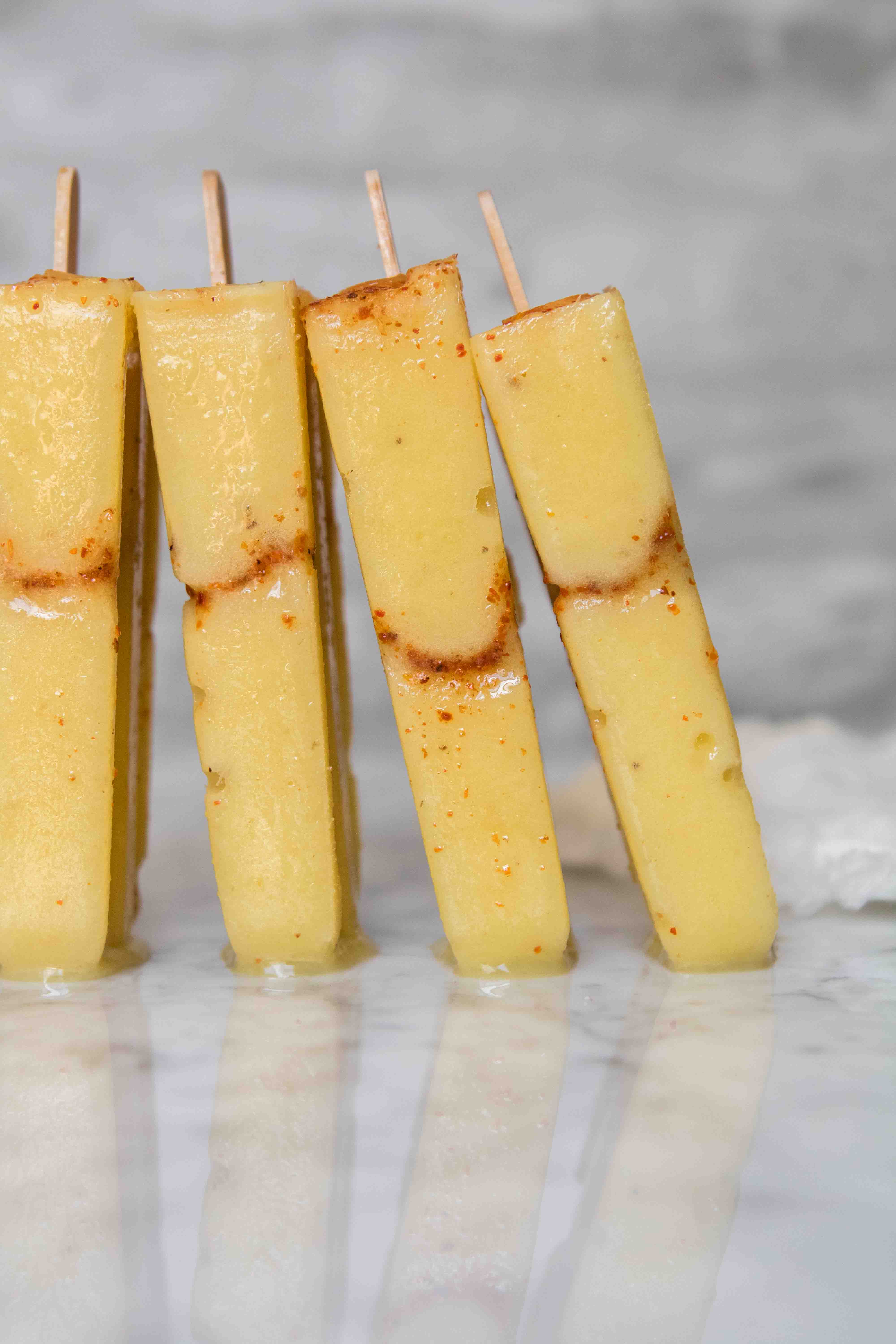 Healthy tajin pineapple popsicles